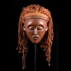 African mask of beautiful Mwana Pwo woman of Chokwe origin in Angola