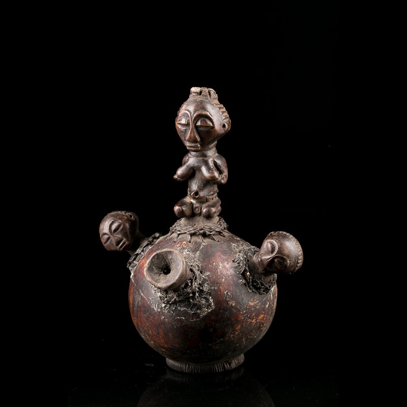 African calabash of Luba origin in the Congo. Ancient African primitive art object.