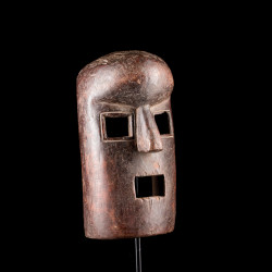 The shapes of this African mask are reminiscent of the Komo and Kumu masks from the DRC.