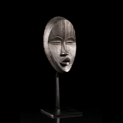 African art mask from Ivory Coast with support