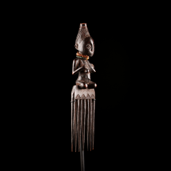 Luba comb with female figure