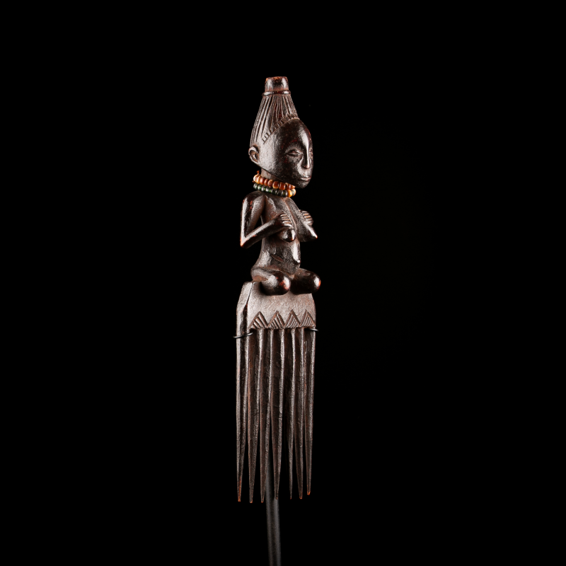 Luba comb with female figure