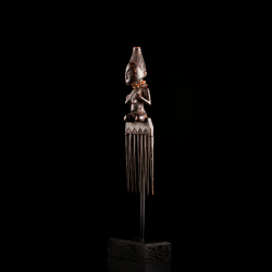 early Luba comb, a prestigious personal ornament from Central Africa.