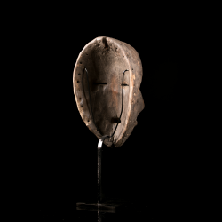 Old Dan wooden mask with costume attachment holes – rear view