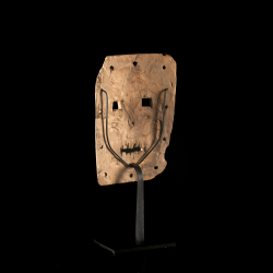 Kumu Ibole mask with weathered wooden surface and surviving traces of pale pigment