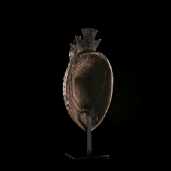 Rear view of an early Ligbi Yangaleya wooden mask showing its refined carving and aged patina.