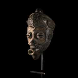 Bena Lulua wooden mask with carved geometric decoration and custom metal display stand.