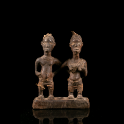 Kongo Lemba wooden couple figure depicting a standing male and female on a shared base.