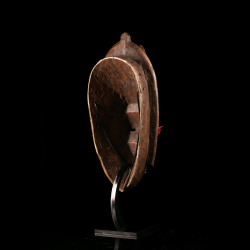 Rear view of a Marka wooden mask showing the carved interior and mounting system.