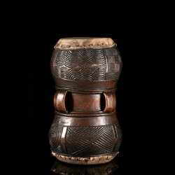 Chokwe Mukupela double-headed wooden drum with deeply carved traditional geometric decoration.