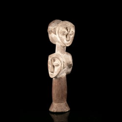 Two-headed Lega Sakimatwemtwe type wooden figure with pale pigment