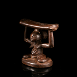 Luba sculpture from Congo with scarification and traditional coiffure