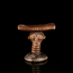 African Songye carved wooden headrest frontal view