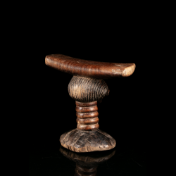 Songye neck rest with ringed neck and grooved hairstyle