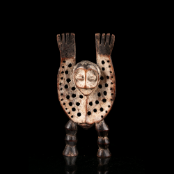Lega Katanda Bwami figure with raised arms and perforated body