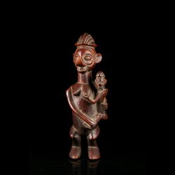 African Yaka maternity sculpture depicting mother and child