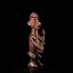 Yaka mother and child wooden figure three-quarter view
