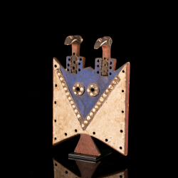 Toussian Ioniake mask with two stylised hornbill heads, Burkina Faso African art, three-quarter view