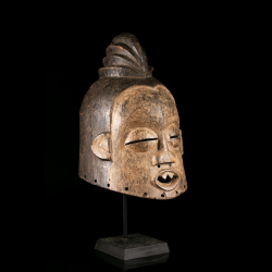 Suku helmet mask from the Democratic Republic of the Congo, three-quarter view