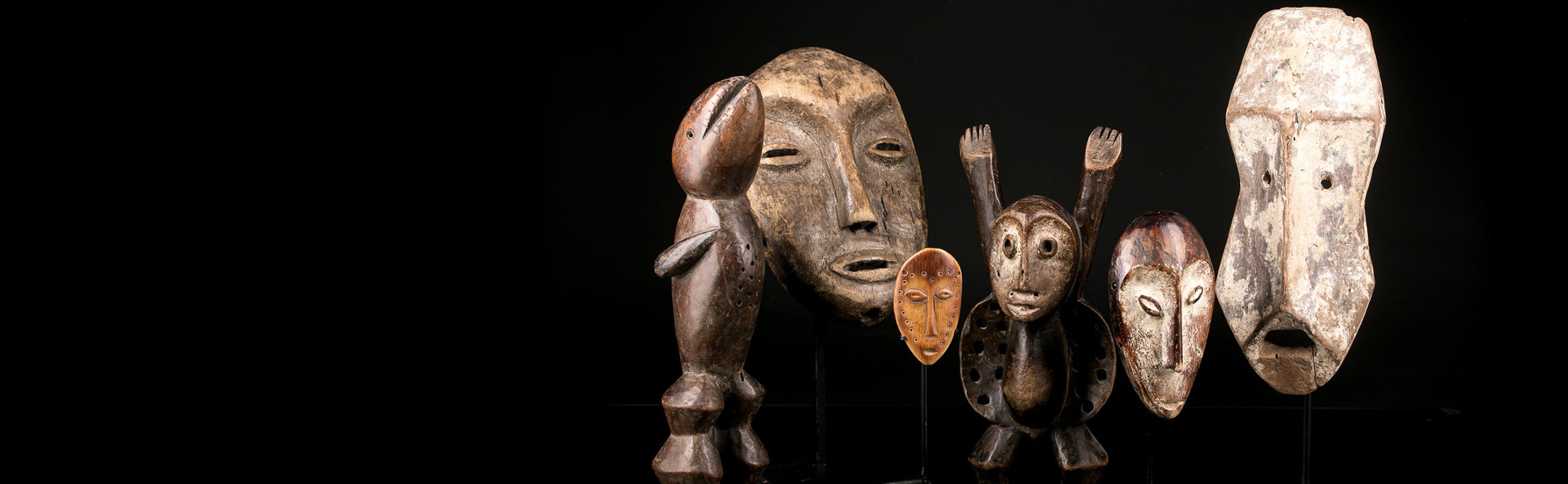 Collection of African masks and African Lega statues for home staging